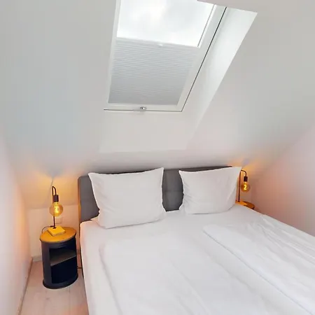 Küstenwaldbude Lee Vakantiehuis *